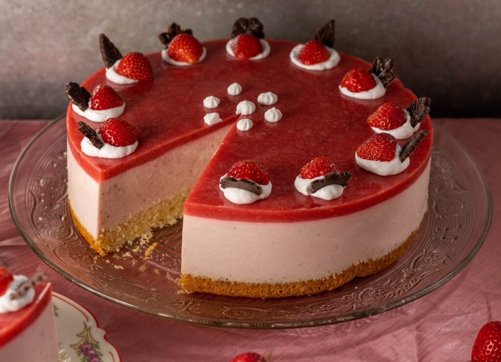 Strawberry cake with cream and yoghurt. The fruit glaze gives it an extra strawberry kick