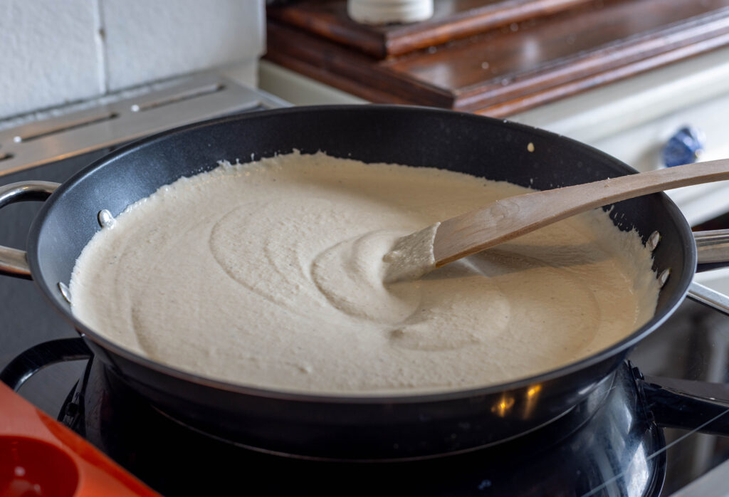 5. Carefully heat the vegan mozzarella mixture while stirring.