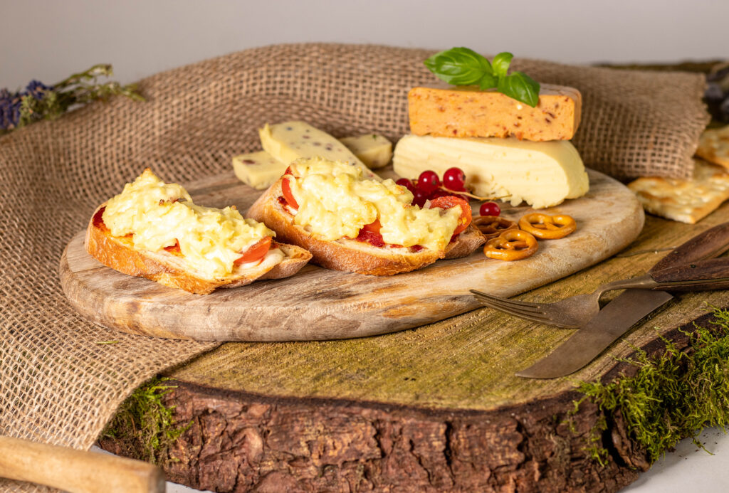 Vegan grated potato cheese, baked on bread