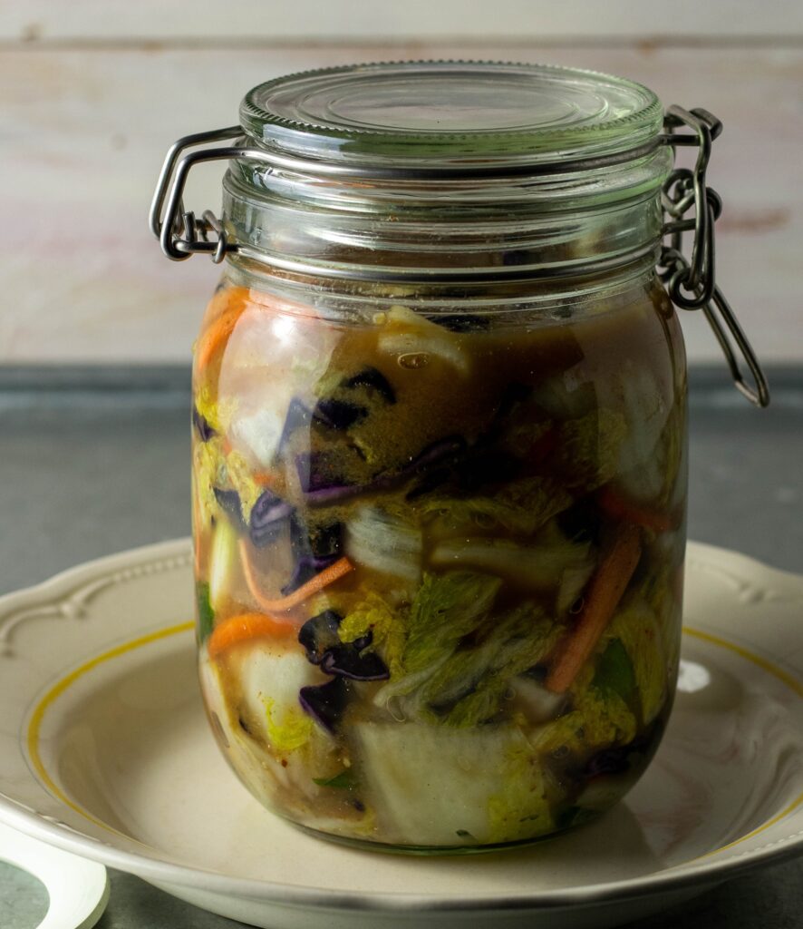 Raw kimchi, called geotjori, in a jar. Ready for it's fermentation.