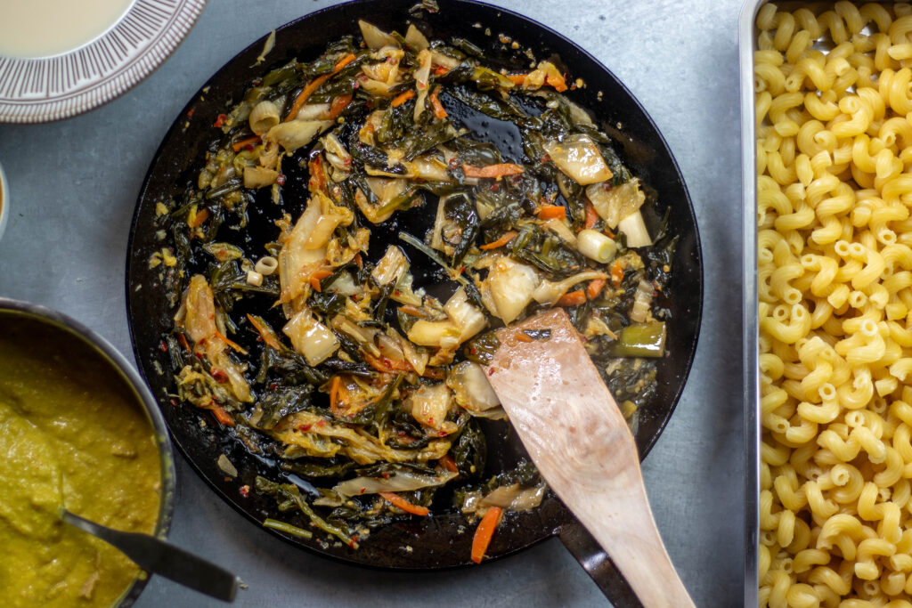 Kimchi frying in a pan.