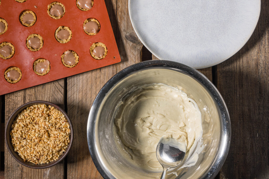 Melting white chocolate over a water bath. Plus more ingredients.